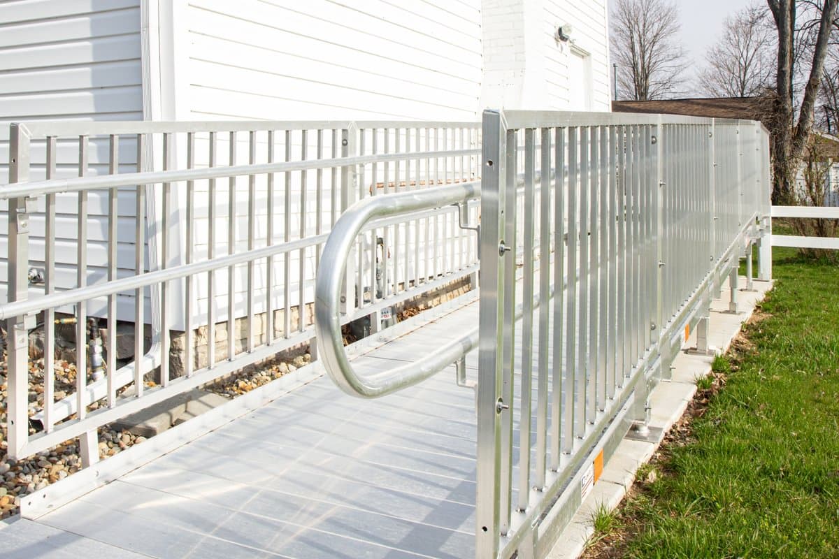 Close-up of installed Rampit USA aluminum ramp at a residential home entry